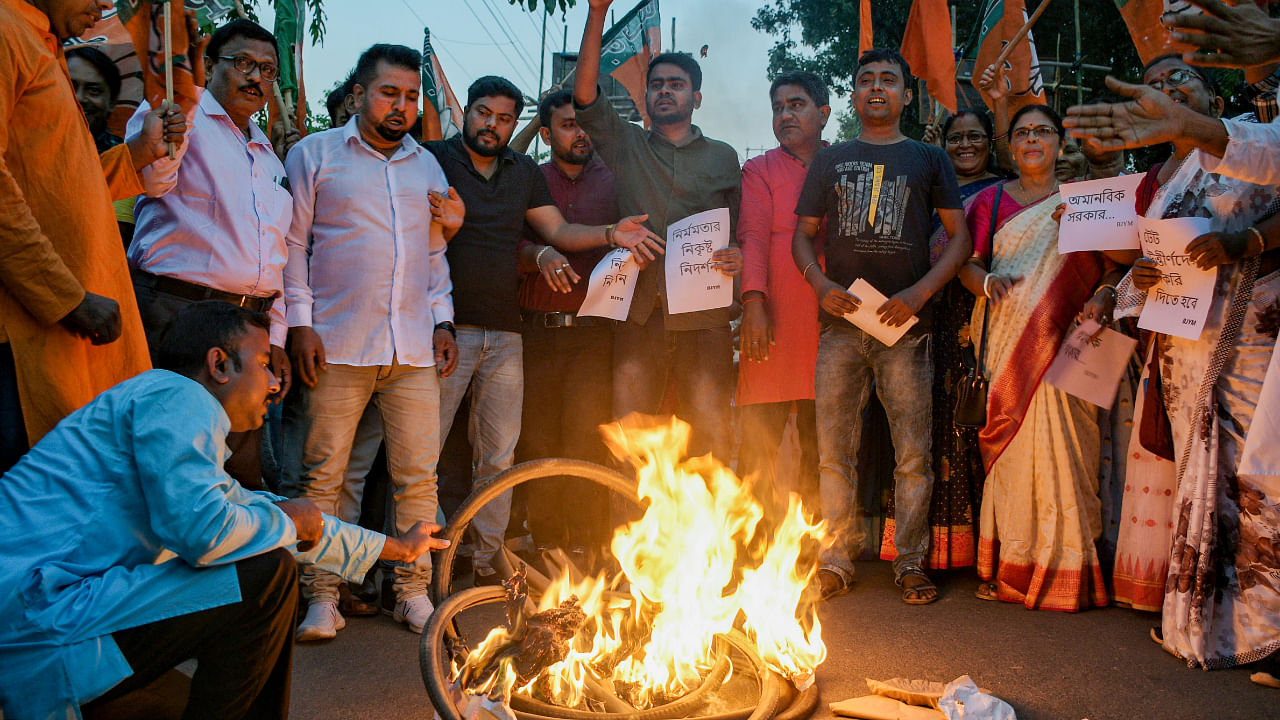 BJP activists stage a protest over forceful removal of TET-qualified students from a protest site on Thursday midnight in Kolkata, in Nadia district. Credit: PTI Photo