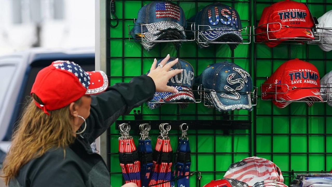 A Republican supporter grabs for Donald Trump apparel before a rally in Raymore, Missouri. Credit: AFP Photo