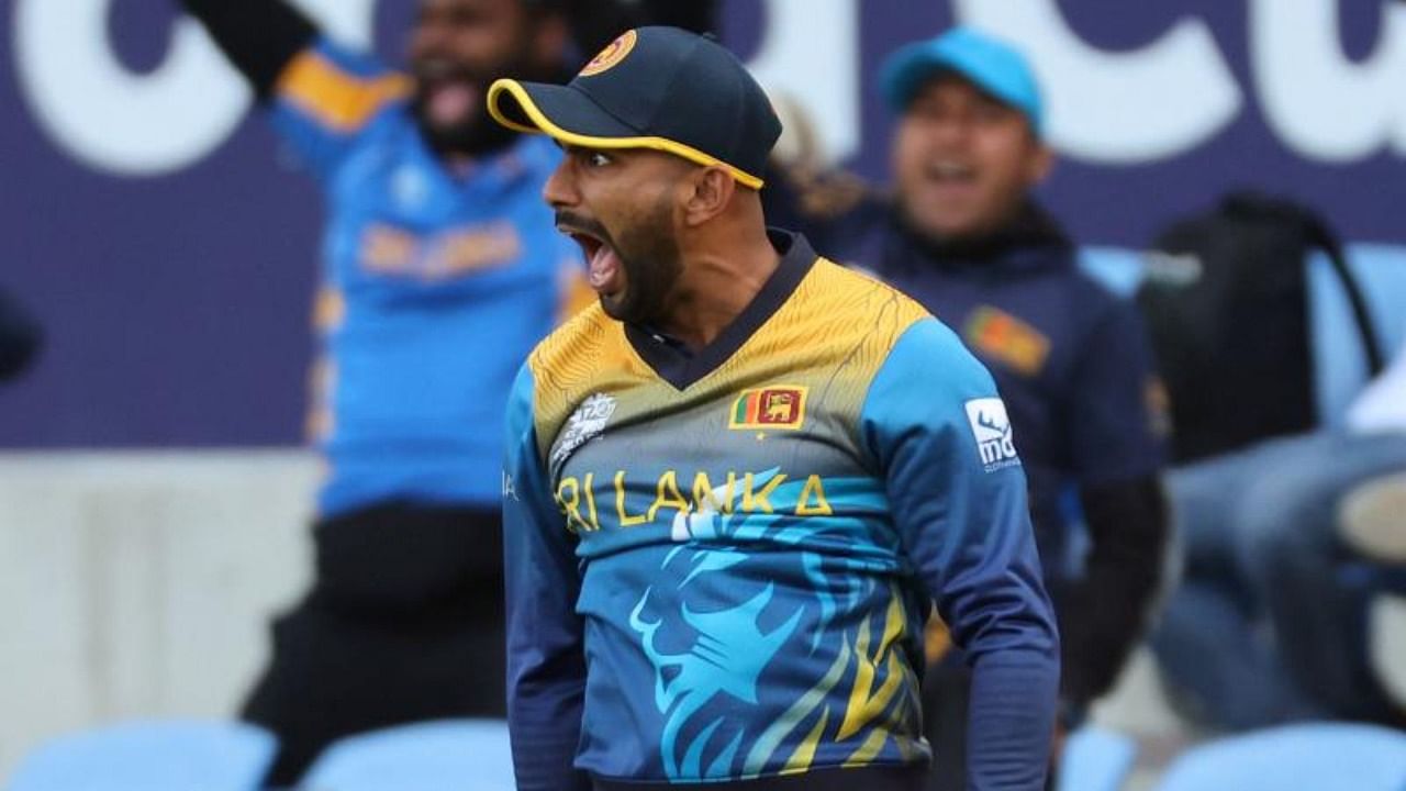 Sri Lanka's Chamika Karunaratne reacts after a catch to dismiss Ireland's Mark Adair during the ICC men's Twenty20 World Cup 2022 cricket match between Sri Lanka and Ireland. Credit: AFP Photo