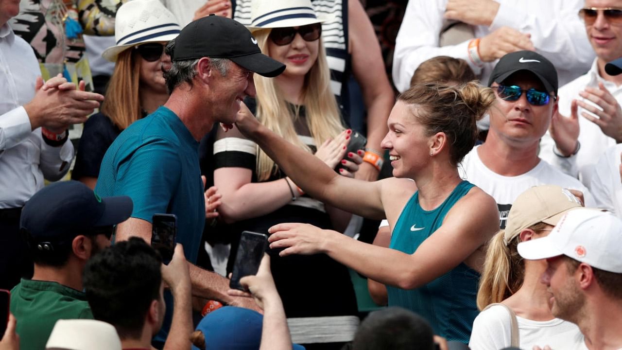 Romania’s Simona Halep and her coach Darren Cahill. Credit: Reuters Photo