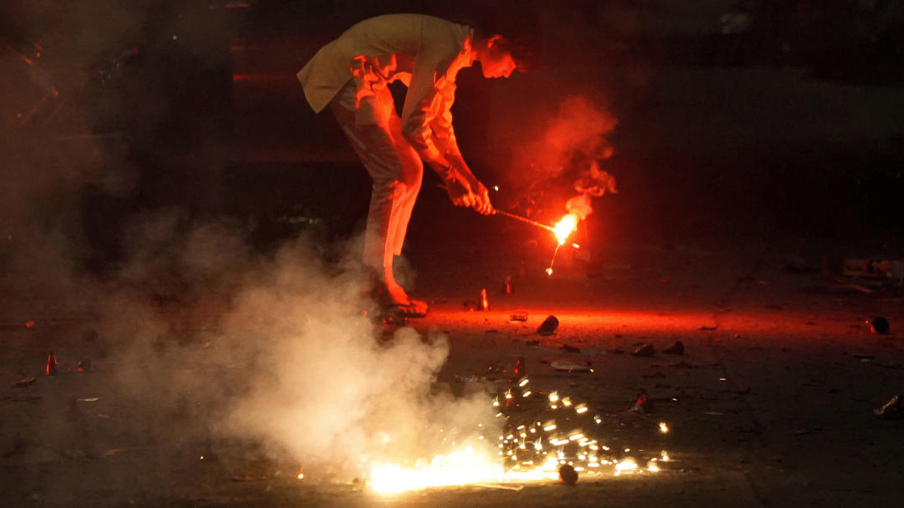 Firecrackers being burst to celebrate Diwali. Credit: PTI Photo