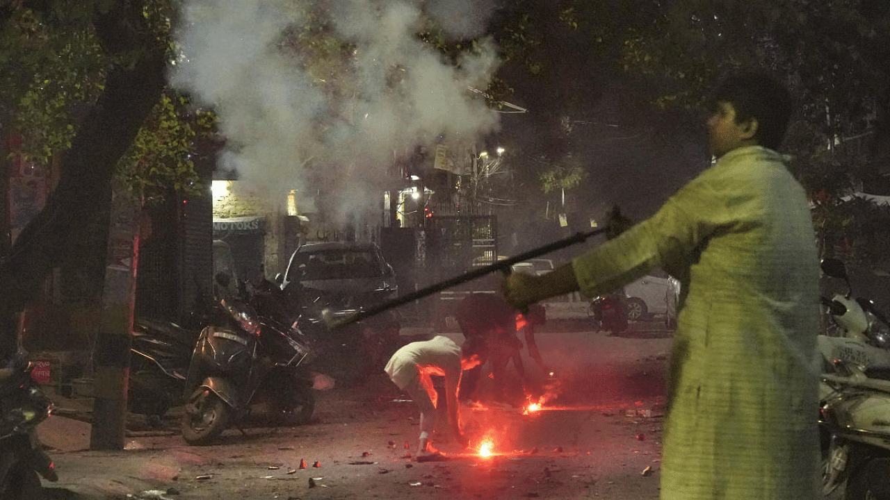 Firecrackers being burst in Delhi for Diwali, flouting ban. Credit: PTI Photo