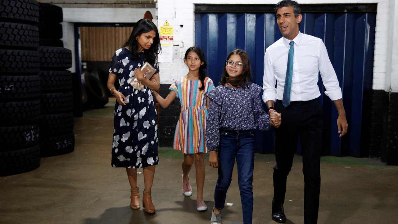 Rishi Sunak with his wife Akshata, and two daughters. Credit: Reuters Photo