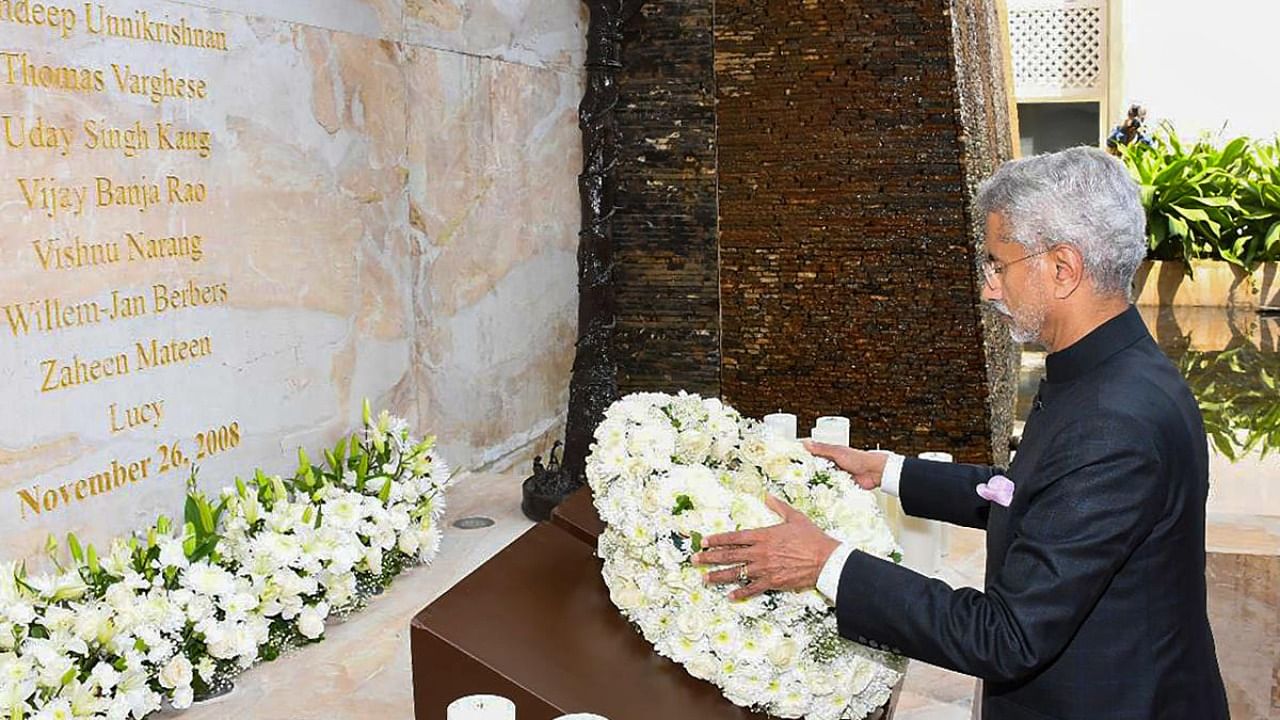 External Affairs Minister S Jaishankar pays tribute to 26/11 victims at a memorial in Hotel Taj Mahal Palace, before a special meeting of the United Nations Security Council’s Counter Terrorism Committee in Mumbai. Credit: PTI Photo