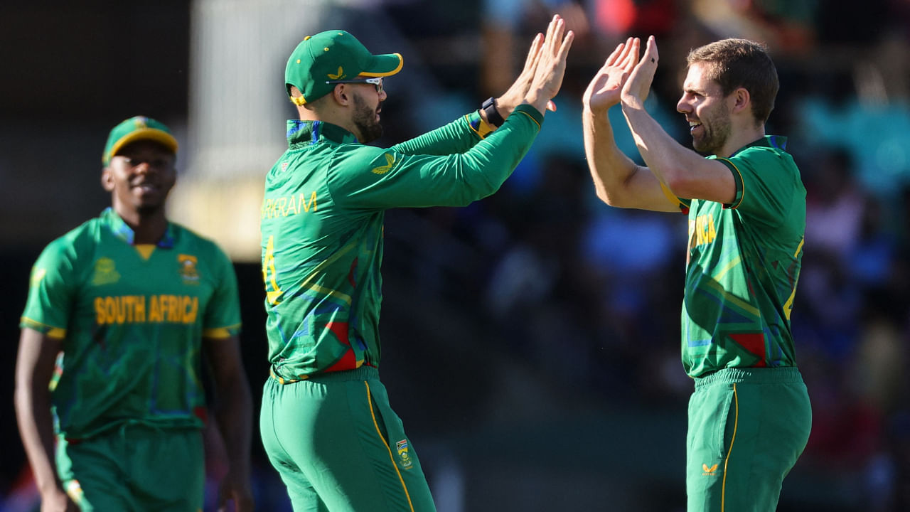 South Africa's Anrich Nortje (R) celebrates a wicket with South Africa's Aiden Markram during the ICC men's Twenty20 World Cup 2022. Credit: AFP Photo
