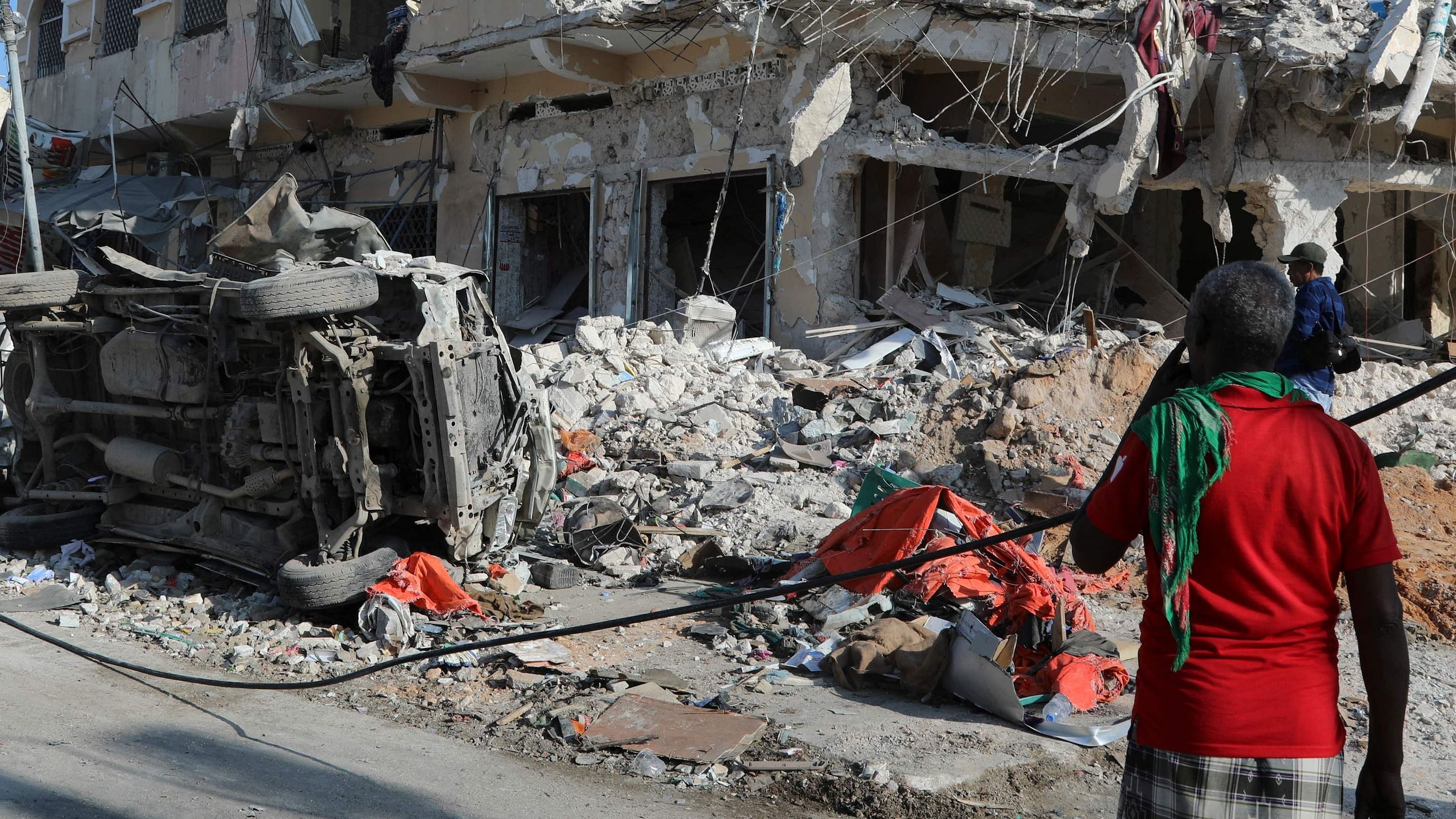 The afternoon explosions shattered windows of nearby buildings, sending shrapnel flying and plumes of smoke and dust into the air. Credit: AFP Photo