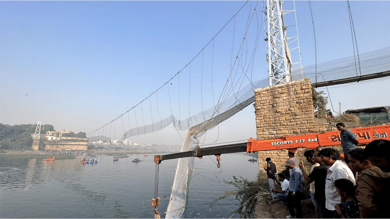 Rescue operations underway after the Morbi bridge collapse in Gujarat. Credit: PTI Photo