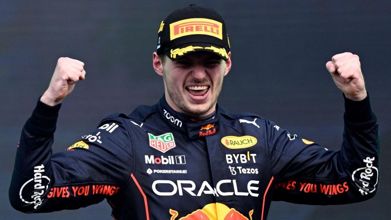 Red Bull Racing's Dutch driver Max Verstappen celebrates on the podium after winning the Formula One Mexico Grand Prix. Credit: AFP Photo