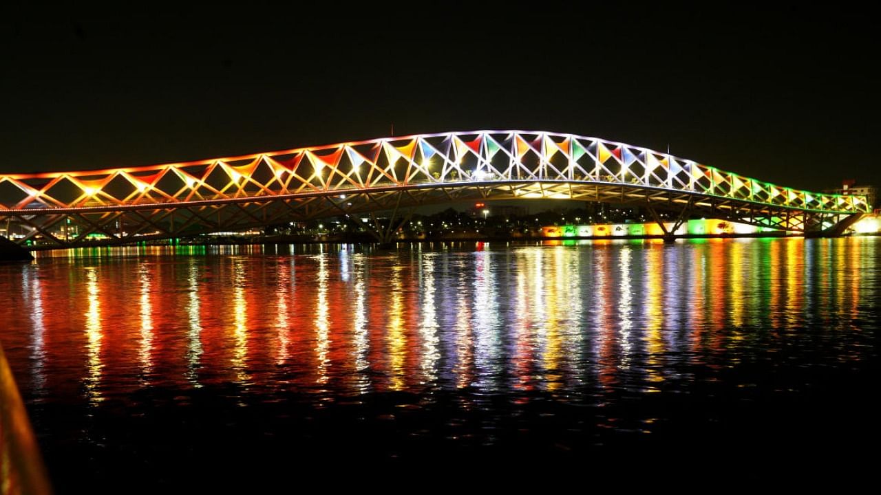 File photo of the Atal bridge over Sabarmati river illuminated with lights. Credit: PTI Photo