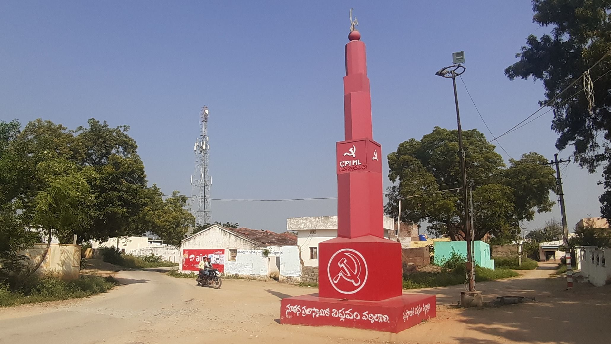 A 40 feet tall imposing CPI (ML) New Democracy stupam (pylon) in Lachamma Gudem village centre, erected in the nineties but is well maintained with a new coat of red paint every year. Credit: DH Photo/ Prasad Nichenametla 