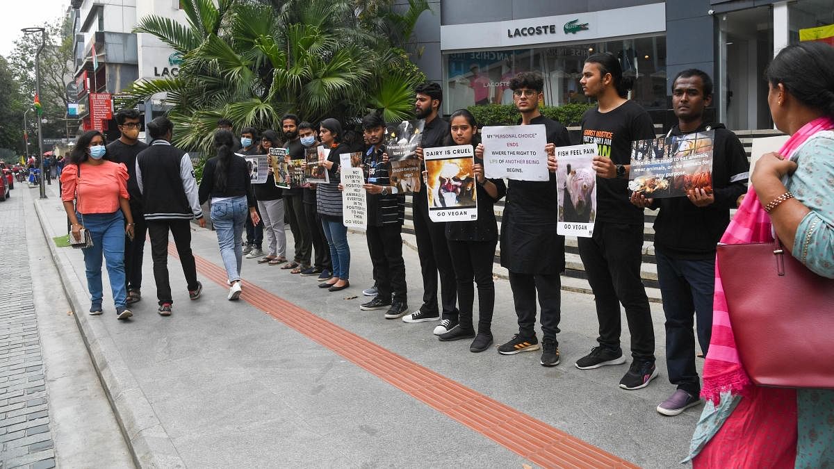 Members of Bengaluru Brigade for Animal Liberation (BBAL) held a demonstration at Church Street on Tuesday. DH Photo/B H Shivakumar