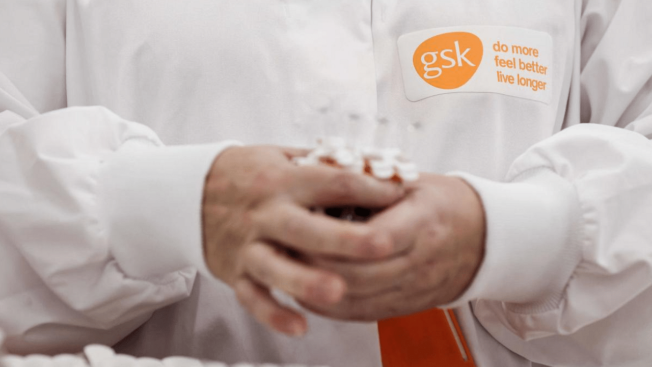 A GSK employee at work at the factory. Credit: AFP Photo