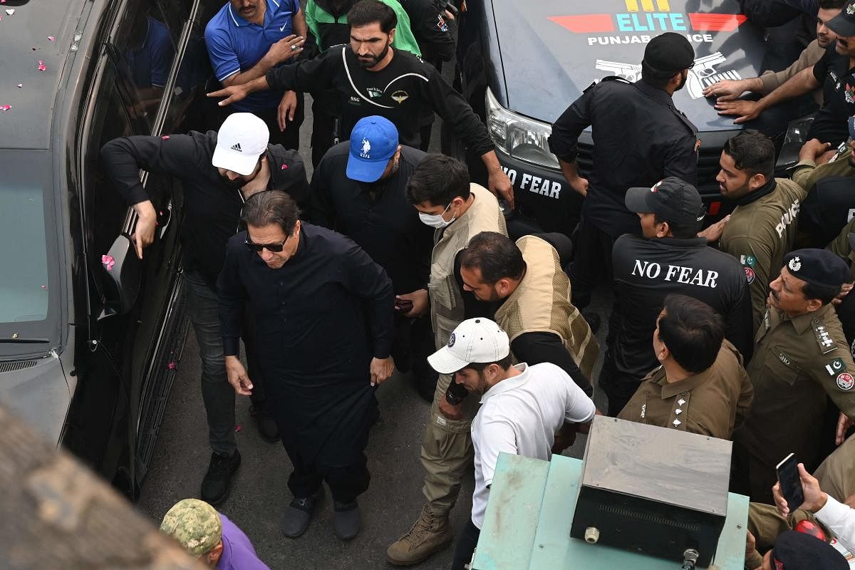 Asad Umar, the senior leader of Khan's Pakistan Tehreek-e-Insaf party, told the media that a bullet hit Khan's leg. Credit: AFP Photo