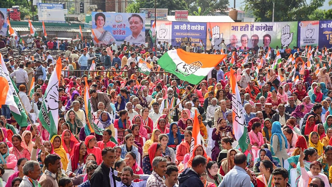 Congress supporters listen to AICC General Secretary Priyanka Gandhi Vadra's address during the party's 'Parivartan Pratigya Rally', in Kangra. Credit: PTI Photo