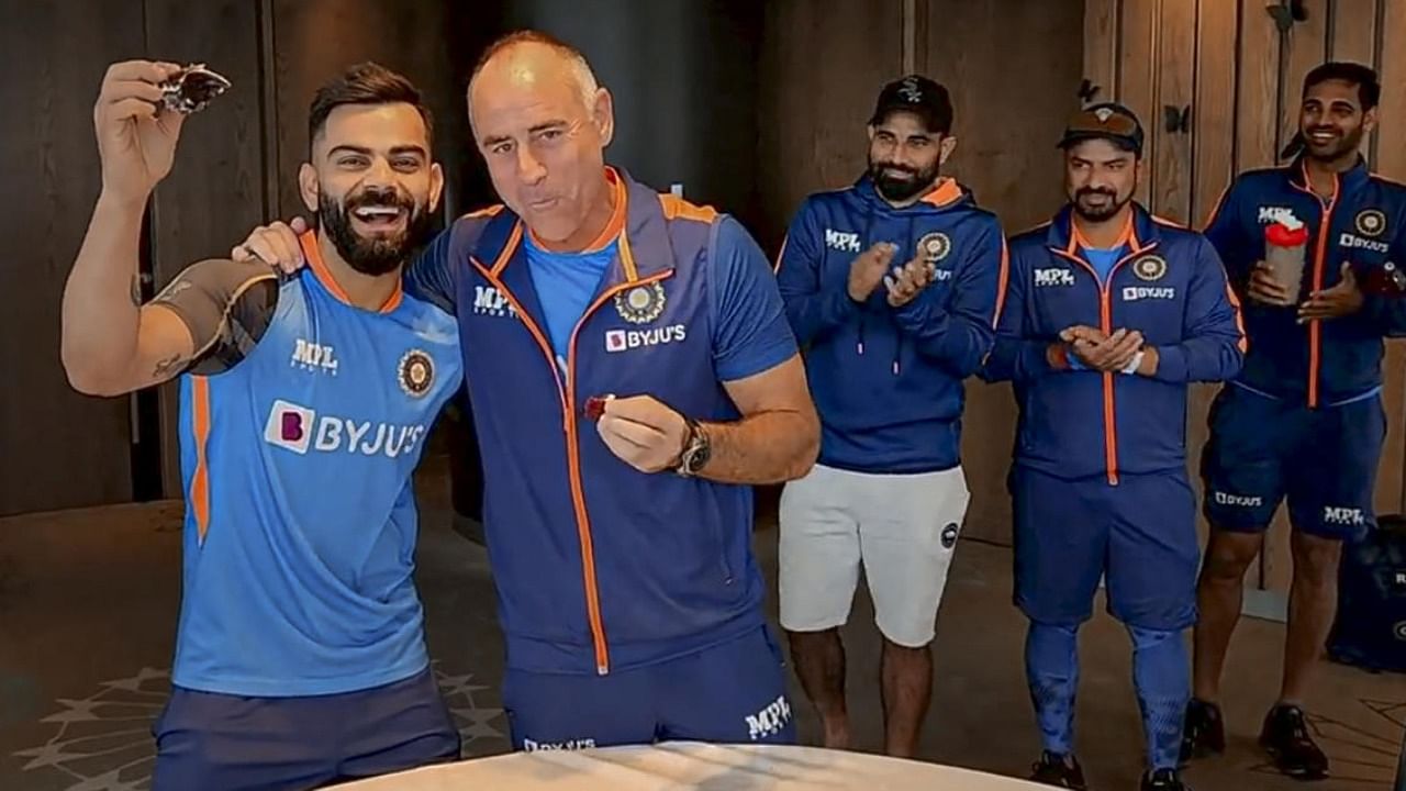 Virat Kohli and Indian cricket team's mental conditioning coach Paddy Upton. Credit: PTI Photo