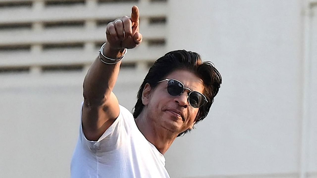 Shah Rukh Khan greets his fans during his birthday celebrations at his Mannat residence in Mumbai. Credit: AFP Photo