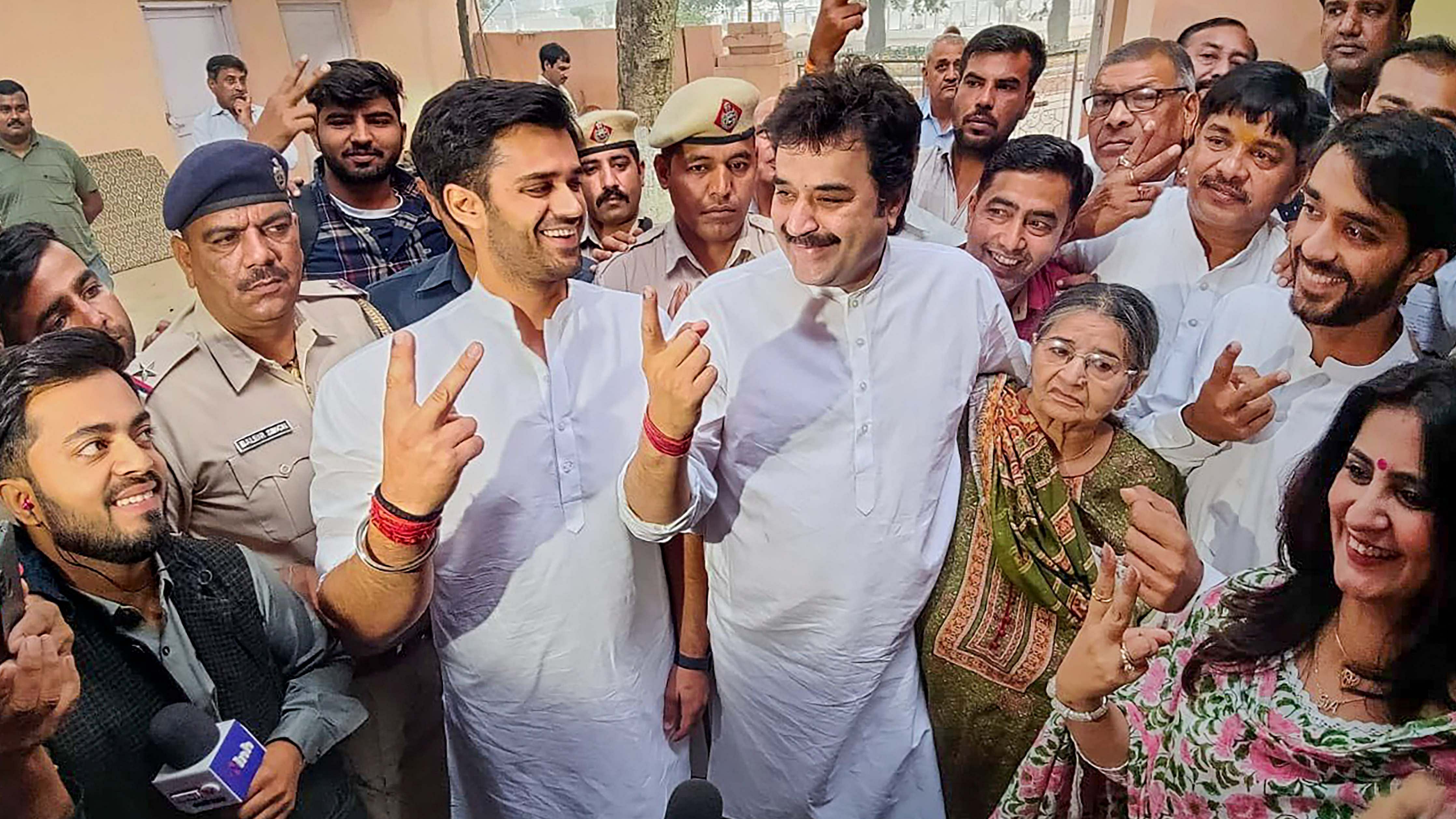 BJP leader Kuldeep Bishnoi with Bhavya Bishnoi. Credit: PTI Photo