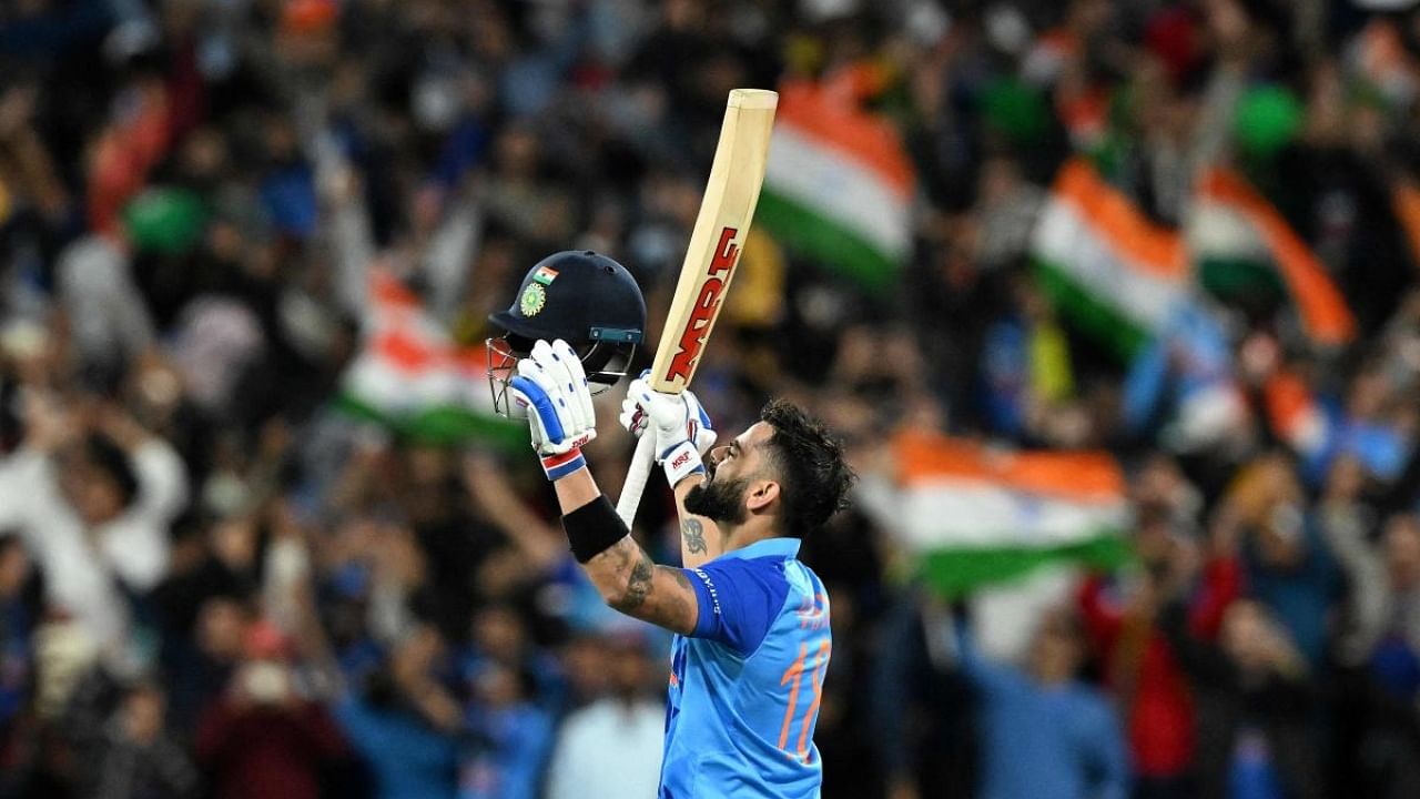 Virat Kohli celebrates after their win during the ICC men's Twenty20 World Cup 2022 cricket match between India and Pakistan at Melbourne Cricket Ground. Credit: AFP Photo