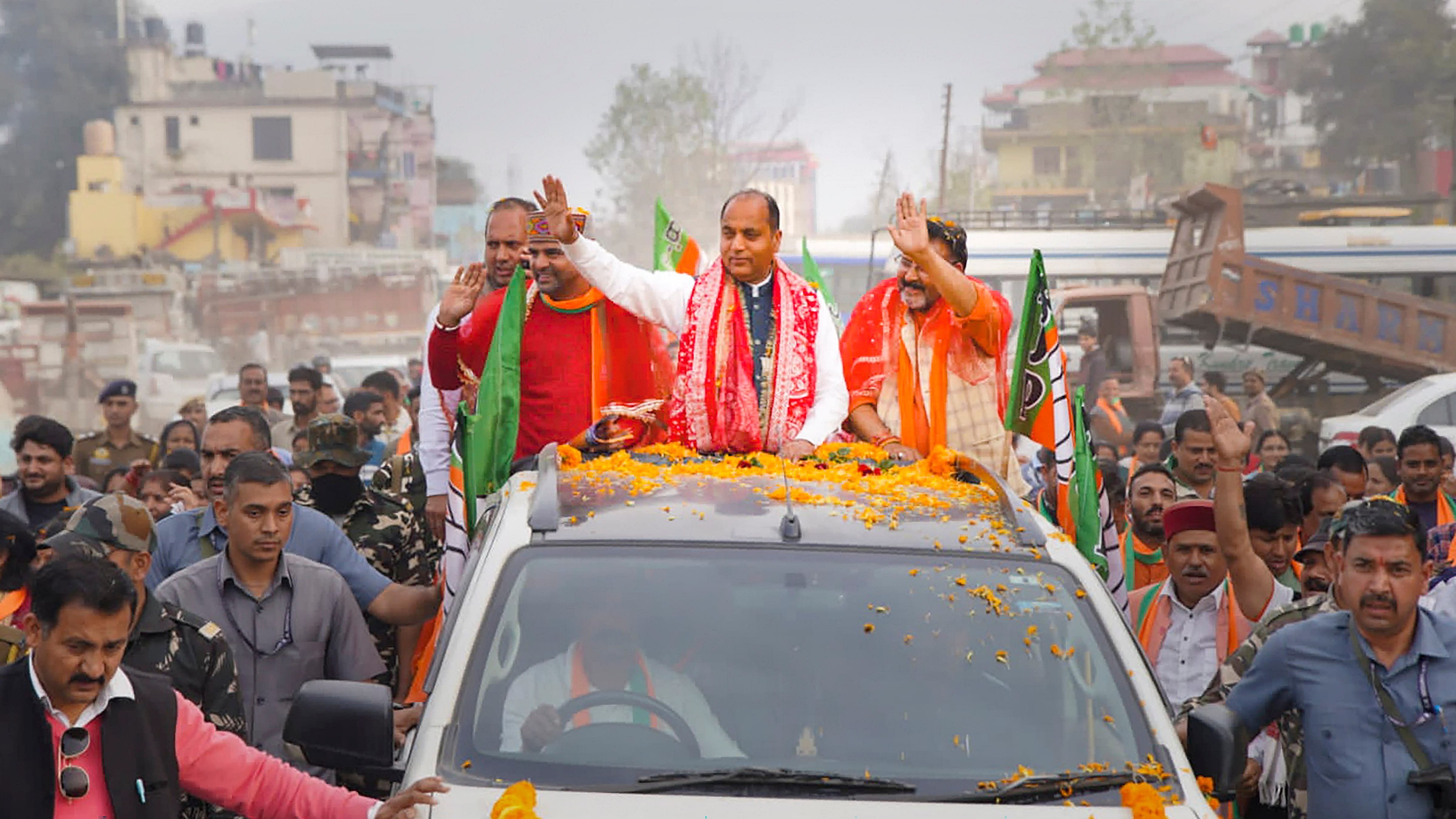 Mandi: Himachal Pradesh CM Jairam Thakur during a road show for state Assembly elections at Balh constituency. Credit: PTI Photo