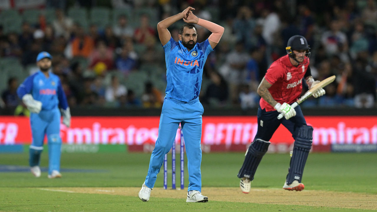 India's Mohammed Shami (C) reacts as England's batters score more runs during the ICC men's Twenty20 World Cup 2022 semi-final cricket match England and India at The Adelaide Oval in Adelaide. Credit: AFP Photo