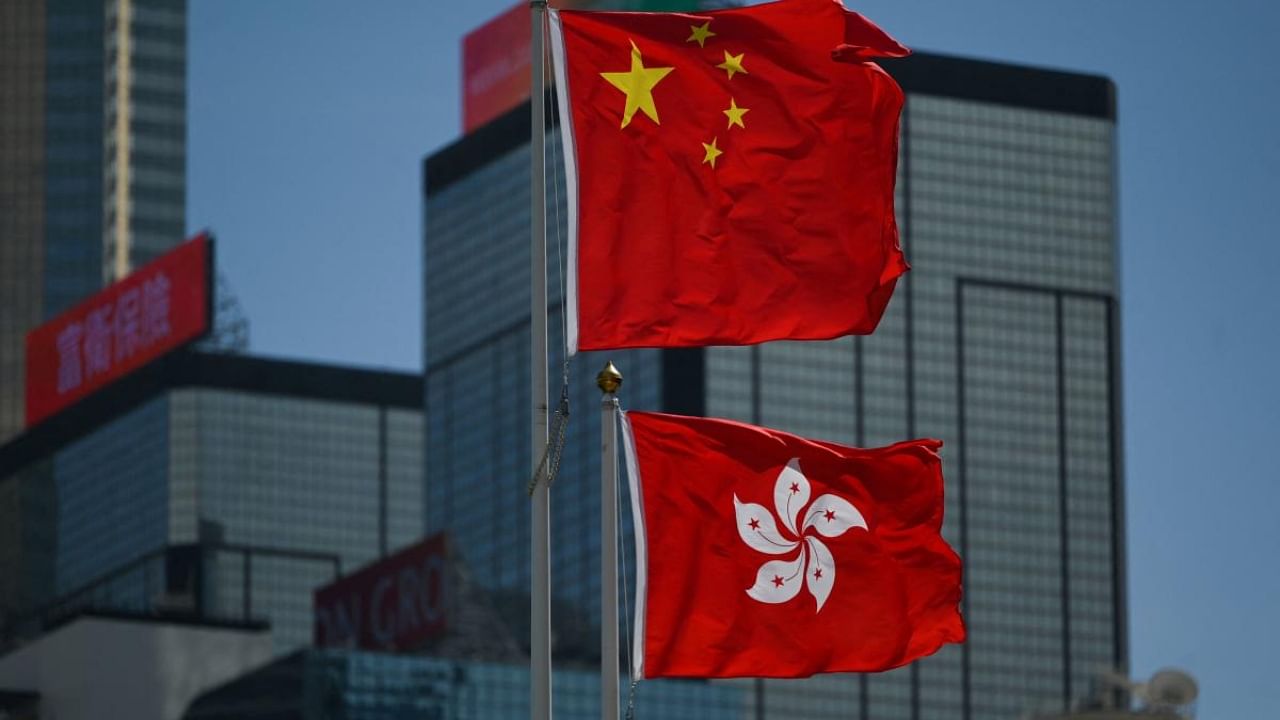 Hong Kong and China flags. Credit: AFP Photo