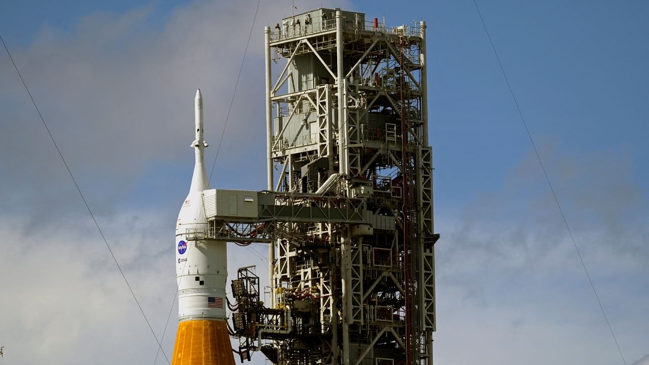 NASA's next-generation moon rocket, the Space Launch System (SLS) rocket with its Orion crew capsule perched on top, stands at launch complex 39-B, while engineers examine possible damage to the vehicle from Hurricane Nicole at Cape Canaveral, Florida, U.S. November 11, 2022. Credit: Reuters Photo