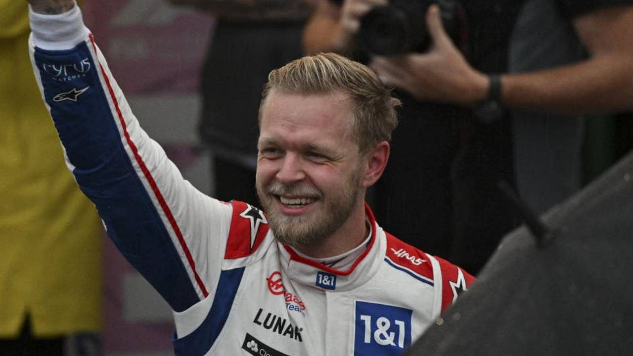 Kevin Magnussen celebrates after winning the qualifying session at the Autodromo Jose Carlos Pace racetrack in Sao Paulo. Credit: AFP Photo