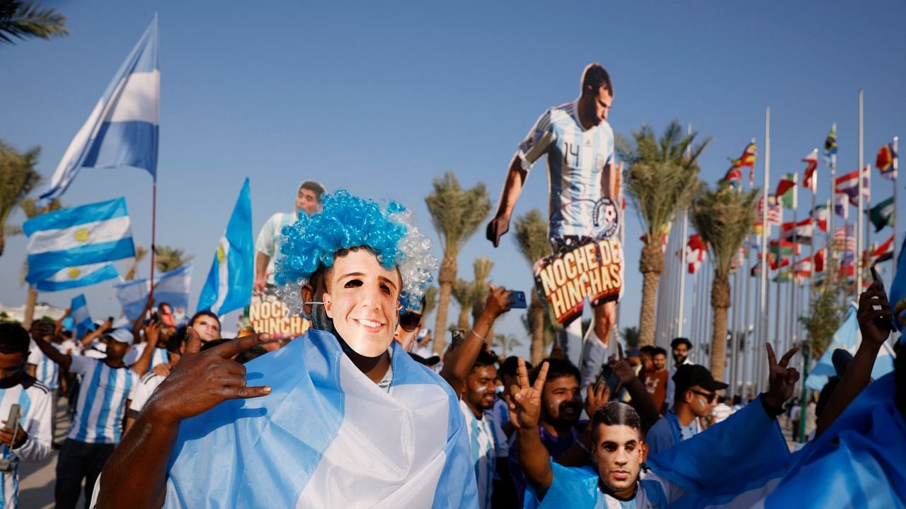 Fans of Lionel Messi, Neymar and Harry Kane converged on the Doha seafront for a march that would normally not have been allowed. Credit: Reuters Photo
