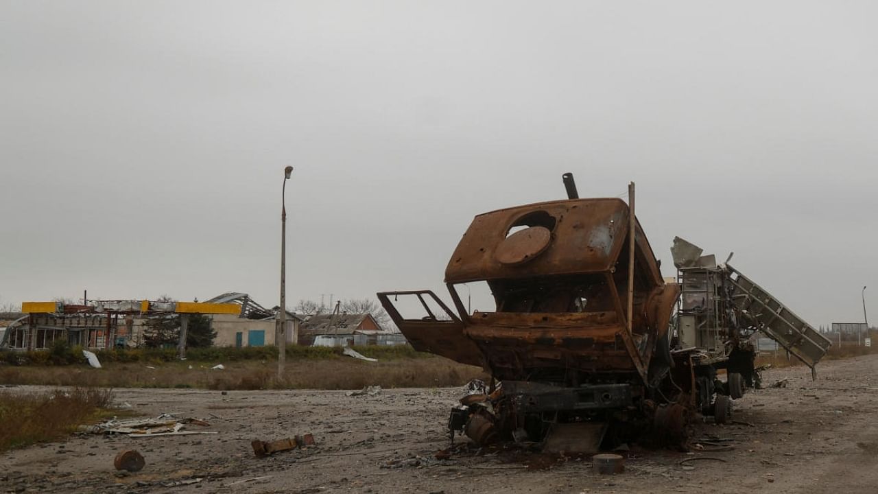 A destroyed truck in seen on a road, amid Russia's attack on Ukraine, in the village of Posad-Pokrovskу, in Kherson region, Ukraine November 11, 2022. Credit: Reuters Photo