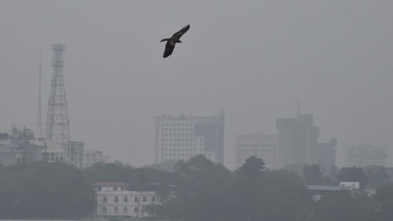 A view of city during in mist on the day near Majestic in Bengaluru on Friday. Credit: DH Photo/B K Janardhan