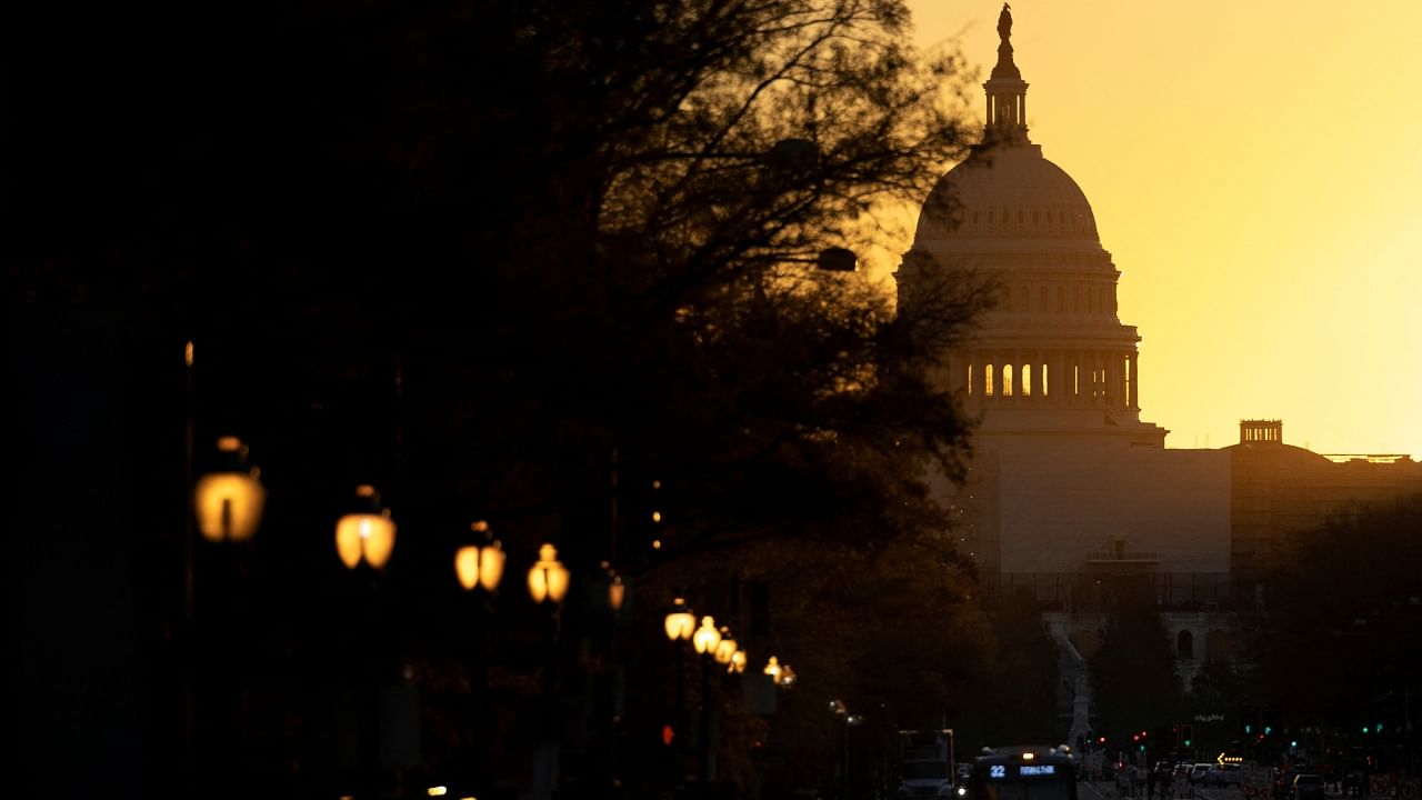 The sun rises over the US Capitol, as control of Congress remained unclear following the 2022 US midterm elections in Washington, US, November 9, 2022. Credit: Reuters Photo