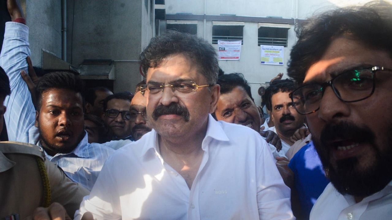 NCP leader Jitendra Awhad comes out of a court after being granted bail, a day after he was arrested for allegedly disrupting a show of Marathi film 'Har Har Mahadev' at a cinema hall, in Thane. Credit: PTI Photo