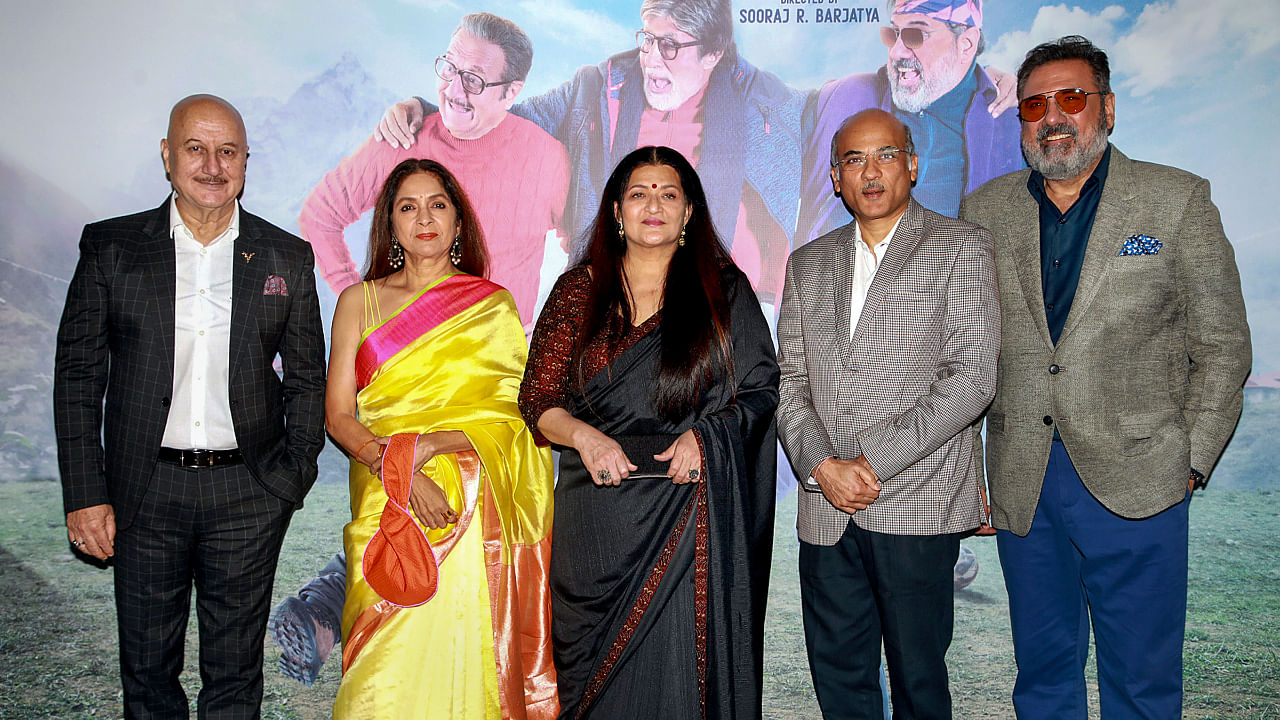 Bollywood actors Anupam Kher, Neena Gupta, Sarika and Boman Irani pose for photos with director Sooraj Barjatya during the trailer launch of their upcoming movie 'Uunchai', in Mumbai. Credit: PTI Photo