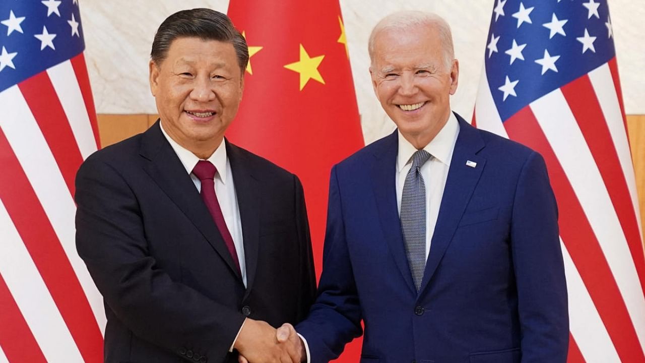 US President Joe Biden (R) and Chinese President Xi Jinping. Credit: Reuters Photo