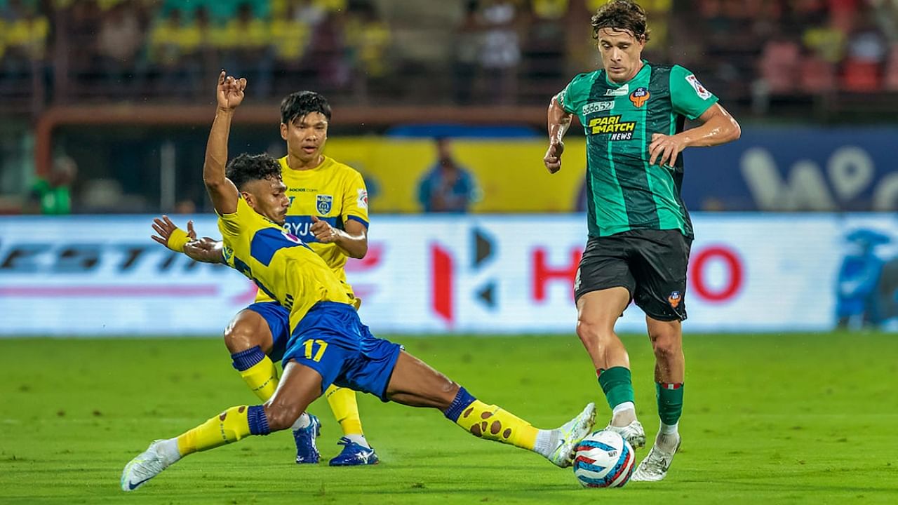 Rahul KP of Kerala Blasters FC and Iker Guarrotxena (right) of FC Goa vie for the ball during the Indian Super League (ISL) 2022-23 football match between Kerala Blasters FC and FC Goa, at Jawaharlal Nehru Stadium in Kochi, Sunday, Nov. 13, 2022. Credit: PTI Photo