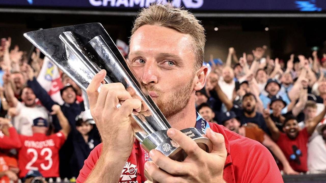 England's Jos Buttler celebrates with the trophy during the ICC men's Twenty20 World Cup 2022 Final between Pakistan and England at MCG. Credit: AFP Photo