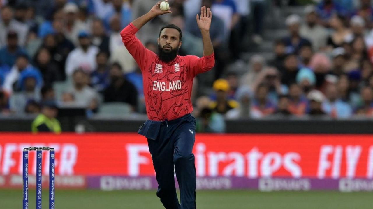 England's Adil Rashid delivers a ball during the T20 World Cup. Credit: AFP Photo