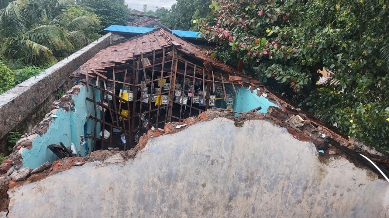The roof of a government primary school collapsed due to recent heavy rains, in a village of Chikkodi taluk in Belagavi district. Credit: DH File Photo