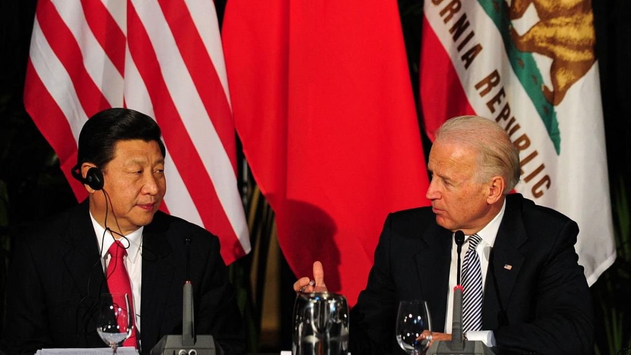 Xi Jinping, Joe Biden. Credit: AFP File Photo
