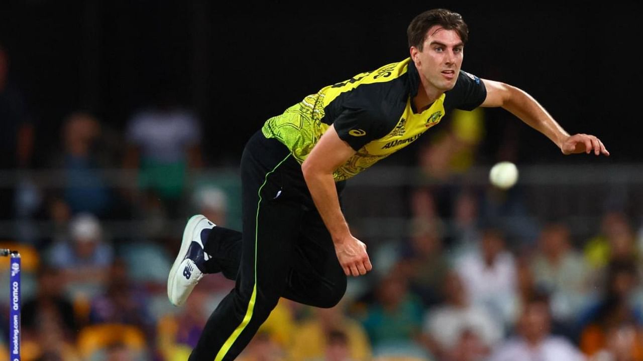 Australia's Pat Cummins bowls during the ICC men's Twenty20 match with Ireland. Photo Credit: AFP Photo