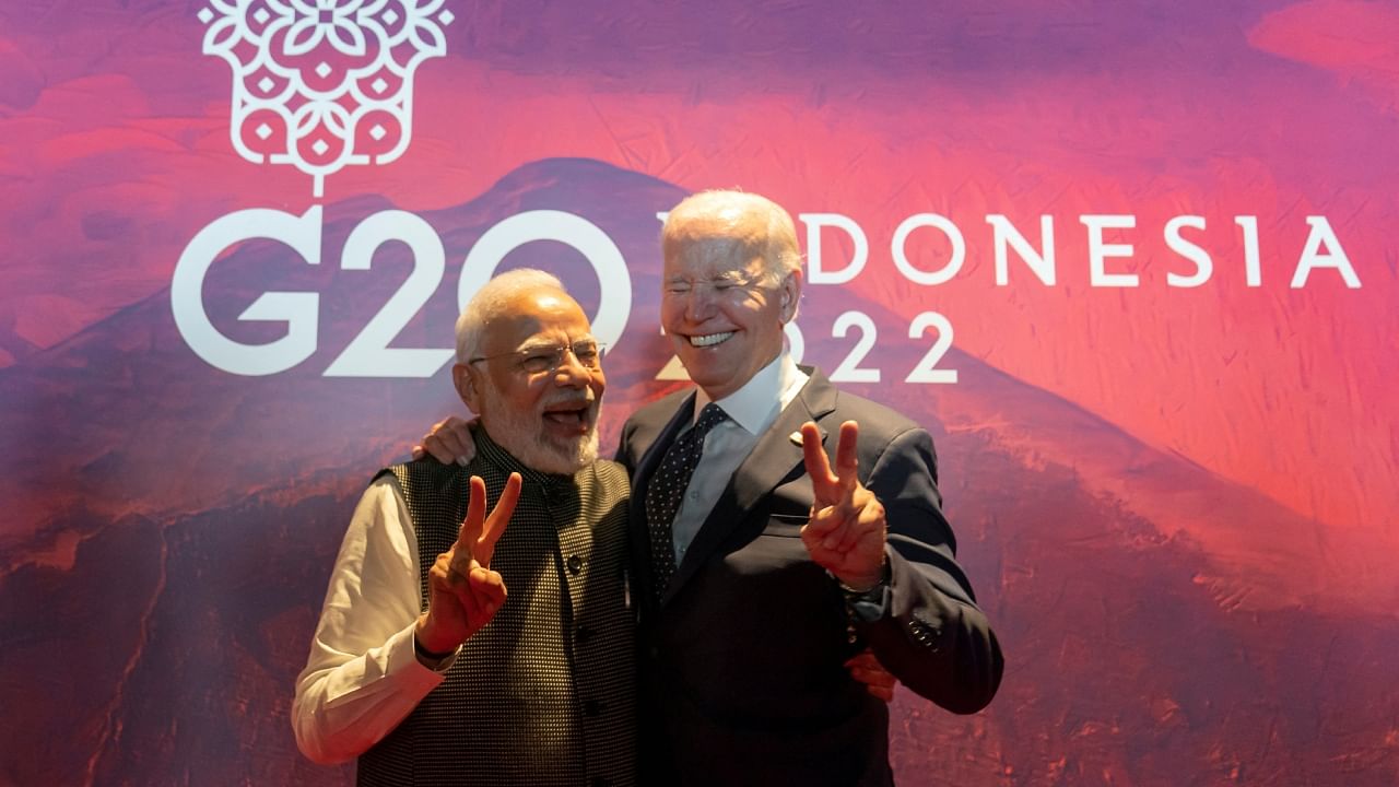 US President Joe Biden and India's Prime Minister Narendra Modi gesture before the Partnership for Global Infrastructure and Investment meeting at the G20 summit, Tuesday, Nov. 15, 2022, in Nusa Dua, Bali, Indonesia. Credit: Reuters Photo