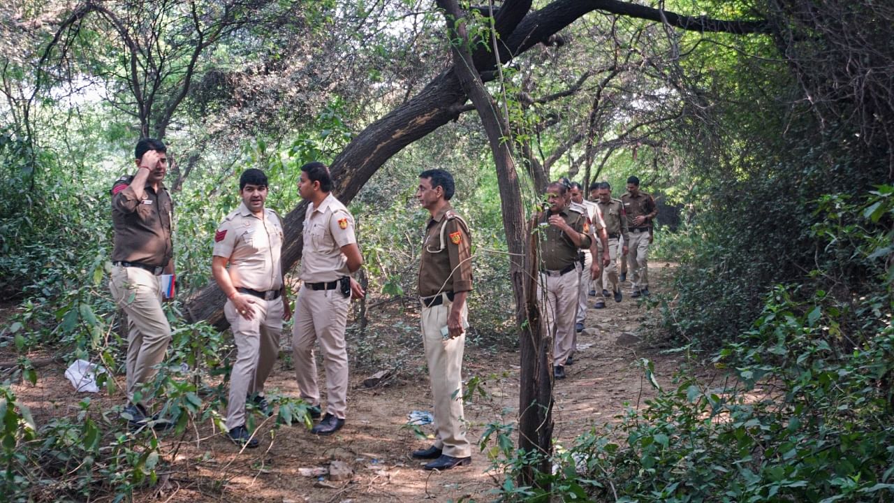 Police personnel at Mehrauli forest area amid investigation in the murder case of Shraddha Walkar, in New Delhi, Tuesday, Nov. 15, 2022. Credit: PTI Photo
