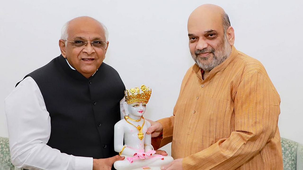 Union Home Minister Amit Shah and incumbent Gujarat CM Bhupendra Patel. Photo Credit: PTI Photo