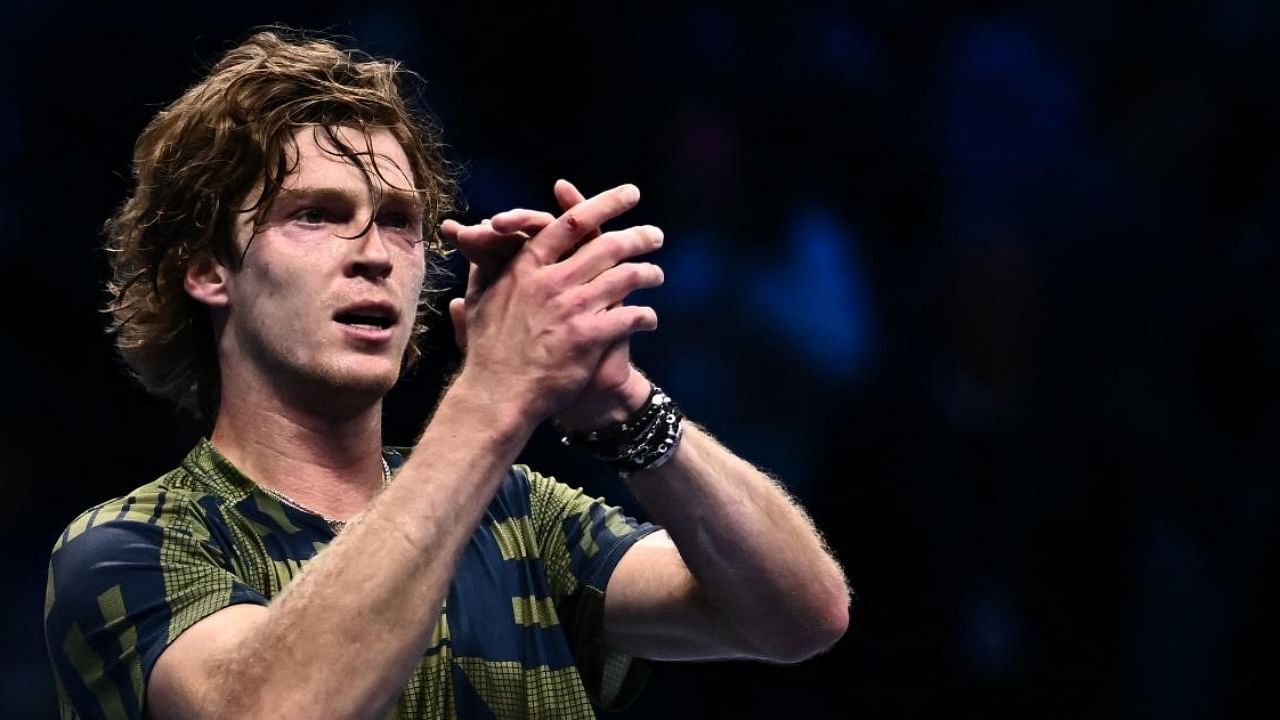 Russia's Andrey Rublev acknowledges the public after winning his first round-robin match against Russia's Daniil Medvedev at the ATP Finals. Photo Credit: AFP Photo