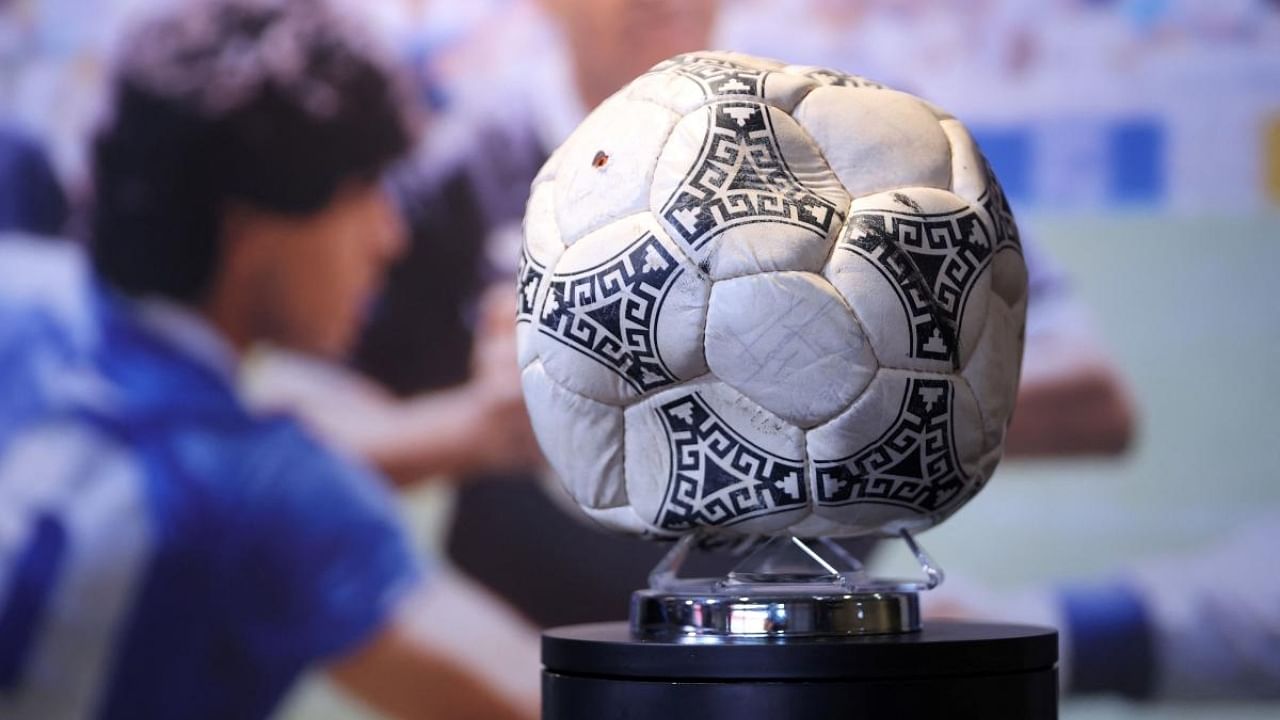 Maradona's 'Hand of God' ball displayed. Credit: AFP Photo