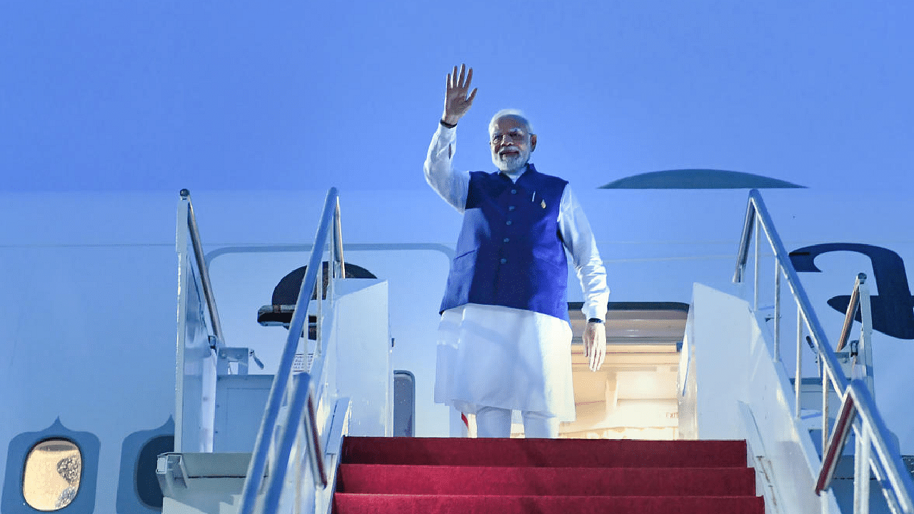 PM Modi emplanes for Delhi after attending the G20 Summit. Credit: PTI Photo
