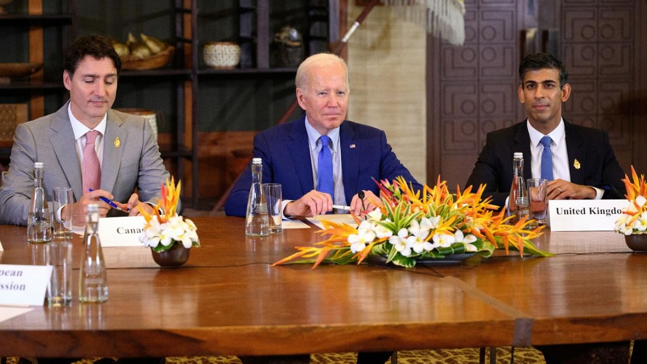 Canada PM Justin Trudeau, US President Joe Biden and British PM Rishi Sunak at the emergency meeting of leaders at the G20 summit after the overnight missile strike on Poland. Credit: Reuters Photo