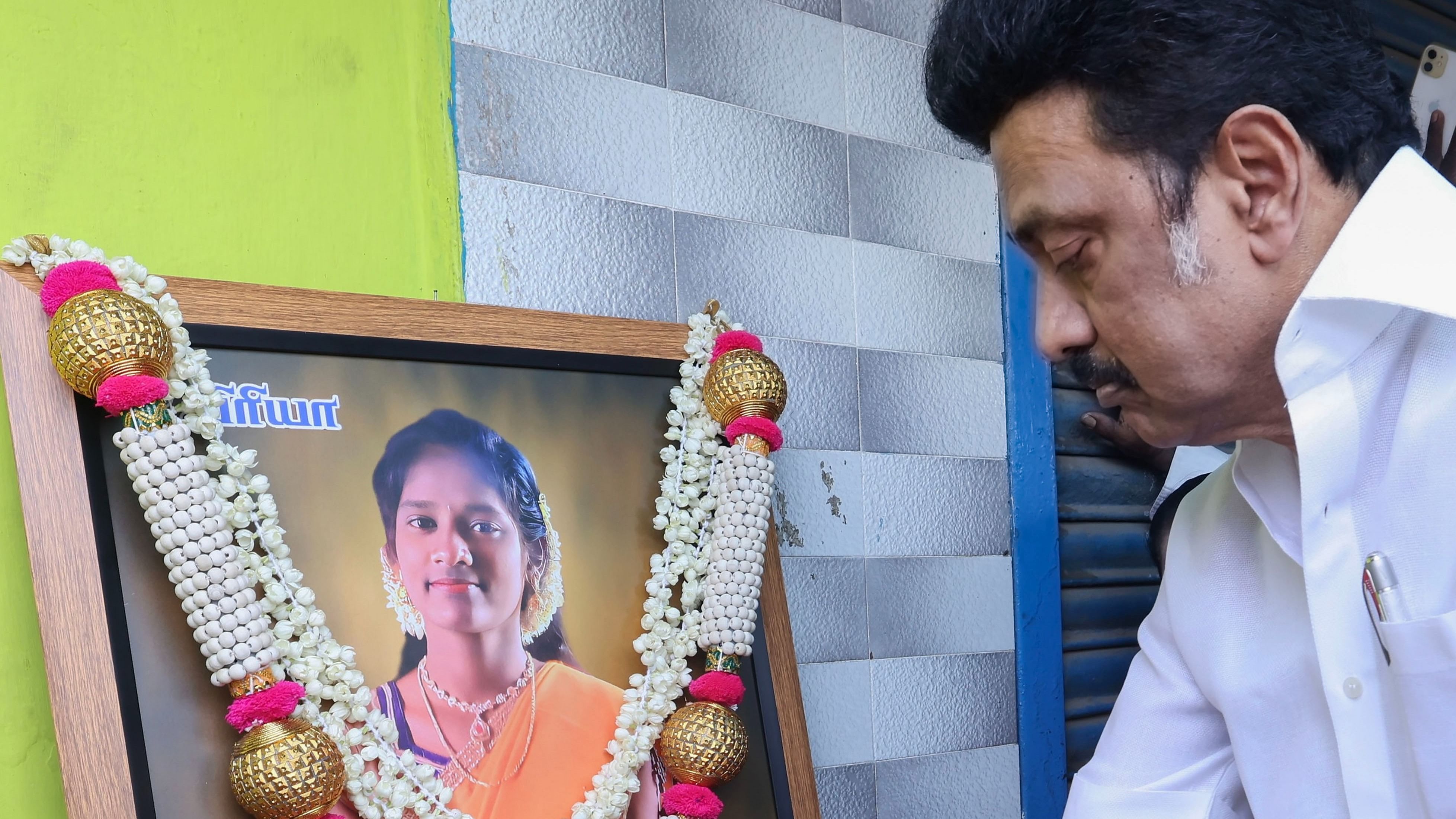 Tamil Nadu Chief Minister M.K. Stalin pays tribute to footballer R Priya. Credit: PTI Photo