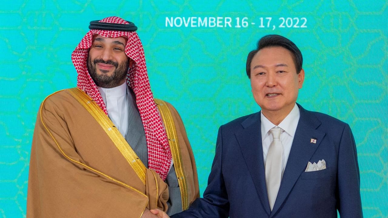 Crown Prince of Saudi Arabia, Mohammed bin Salman shakes hand with South Korea's President Yoon Suk-yeol as they pose for a photo, in Seoul, South Korea, November 17, 2022. Credit: Reuters Photo