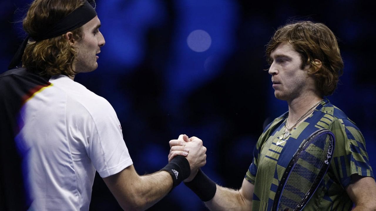 Russia's Andrey Rublev shakes hands with Greece's Stefanos Tsitsipas. Credit: Reuters Photo